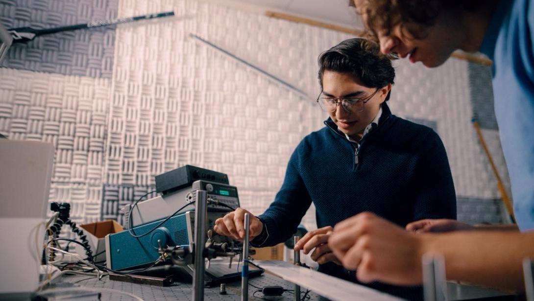 Two students working in the Acoustics Lab